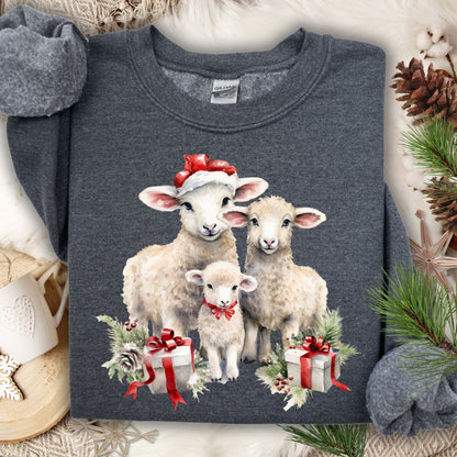 Dark gray crewneck sweatshirt with three watercolor lambs in Santa hats and gifts.