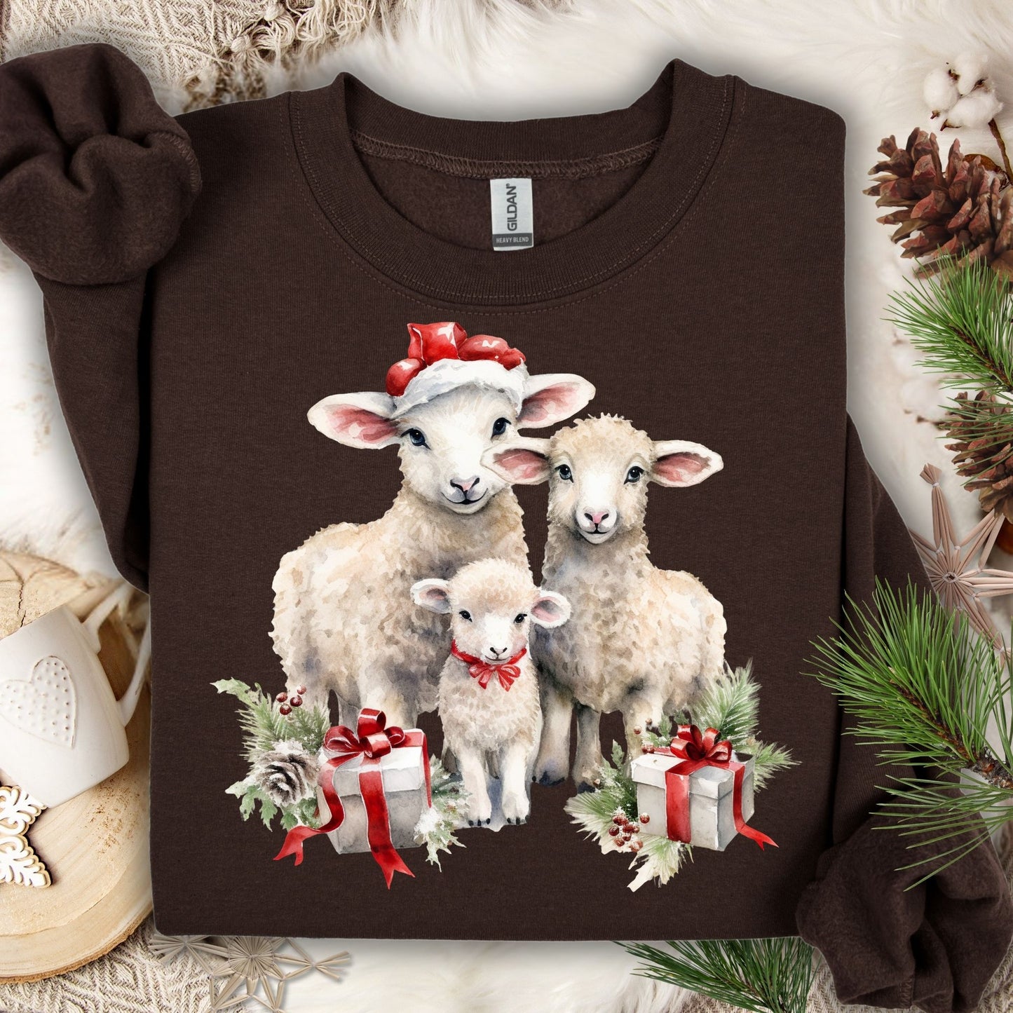 Dark Chocolate Gildan sweatshirt with three watercolor lambs in Santa hats and gifts.