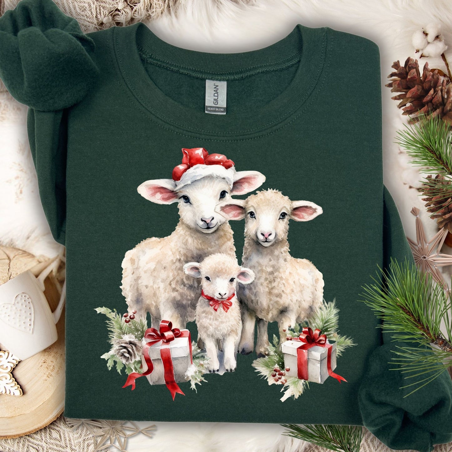 Forest Green Christmas Lambs Sweatshirt with three watercolor lambs in Santa hats and gifts.