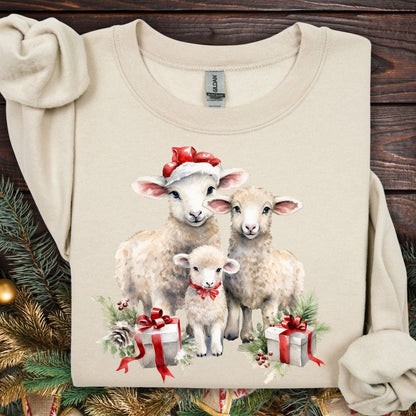Sand crewneck sweatshirt with three watercolor lambs in Santa hats and gifts.
