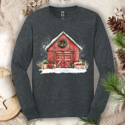 Dark Heather Gildan Softstyle long sleeve tee with watercolor red barn, snow, gifts, and wreath.
