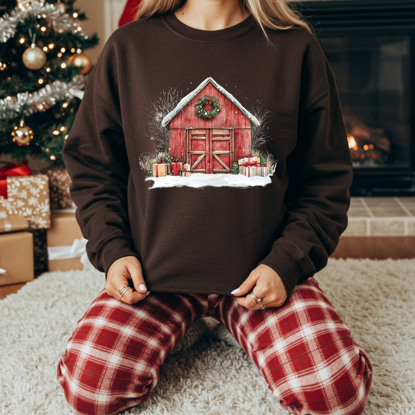 Brown Gildan fleece sweatshirt with a watercolor red barn, snow, and gifts design.