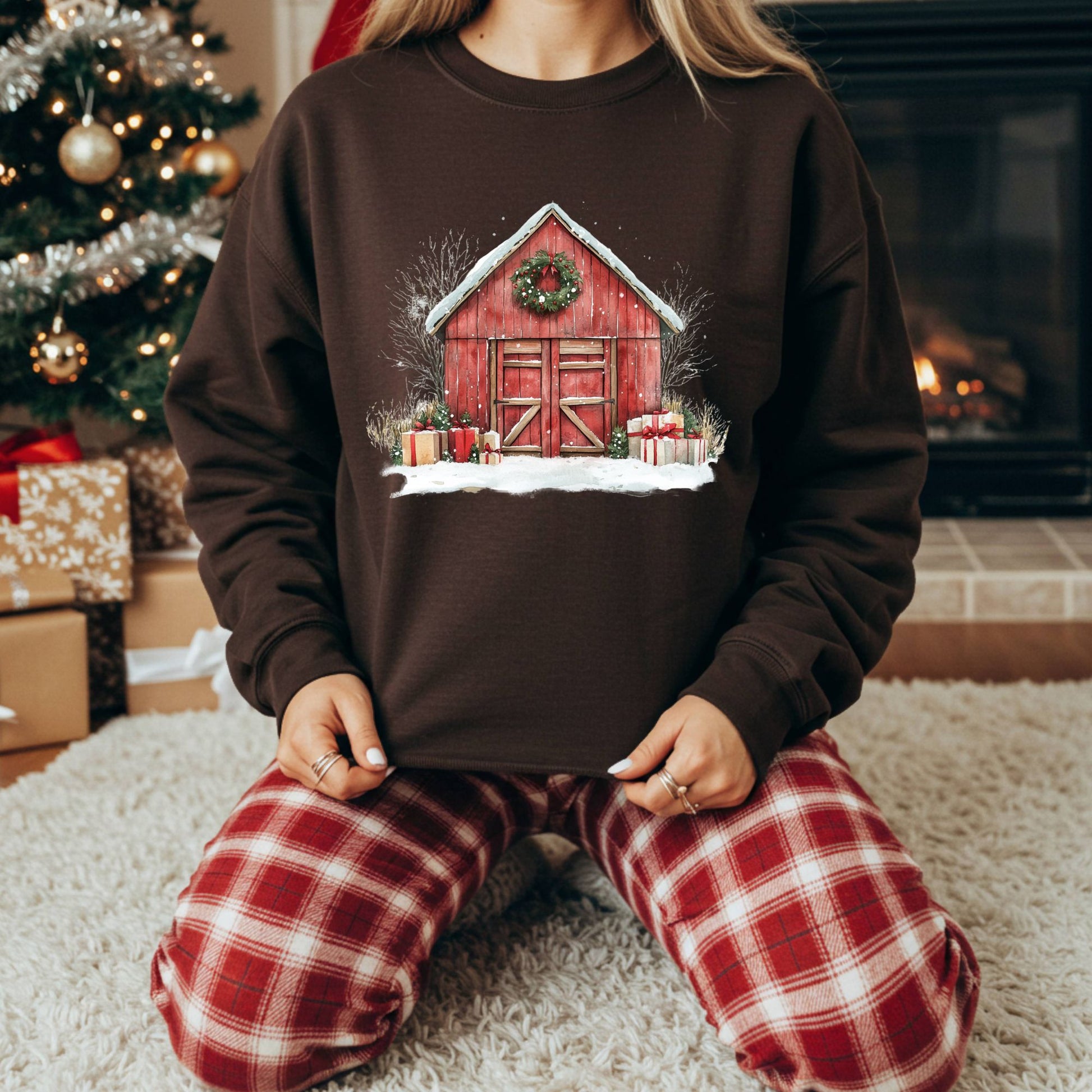 Brown Gildan fleece sweatshirt with a watercolor red barn, snow, and gifts design.