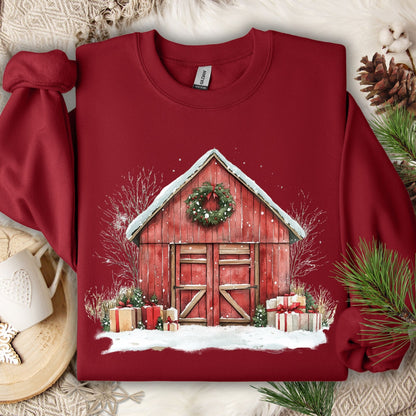 Cardinal Red Gildan fleece sweatshirt with a watercolor red barn, snow, wreath, and gifts.