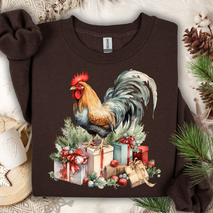 Dark Chocolate Gildan sweatshirt with a watercolor Christmas rooster on gifts and pine.