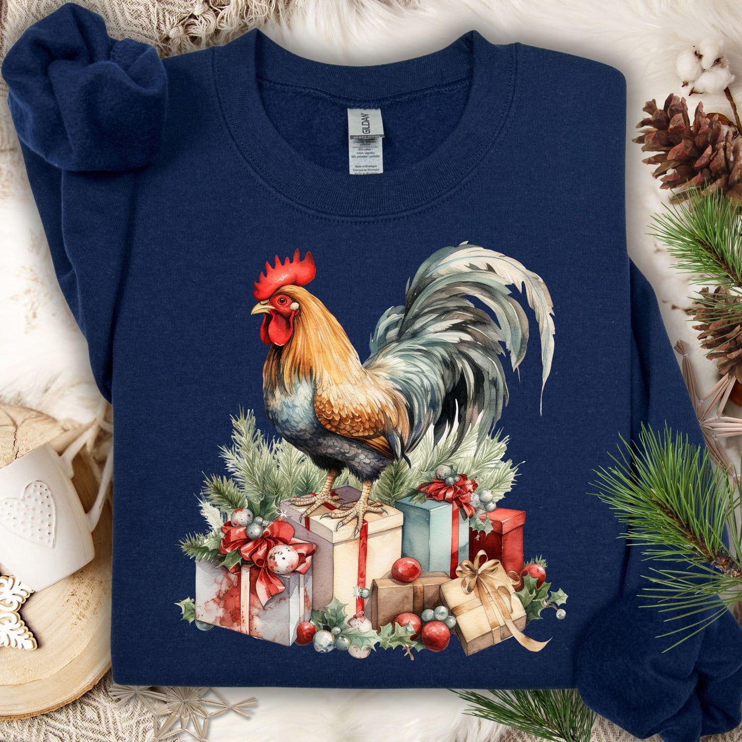 Navy Gildan Christmas Rooster Sweatshirt, size S, with a watercolor rooster on festive gifts and pine.