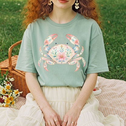 Relaxed-fit, garment-dyed sage green t-shirt with a watercolor floral crab design.