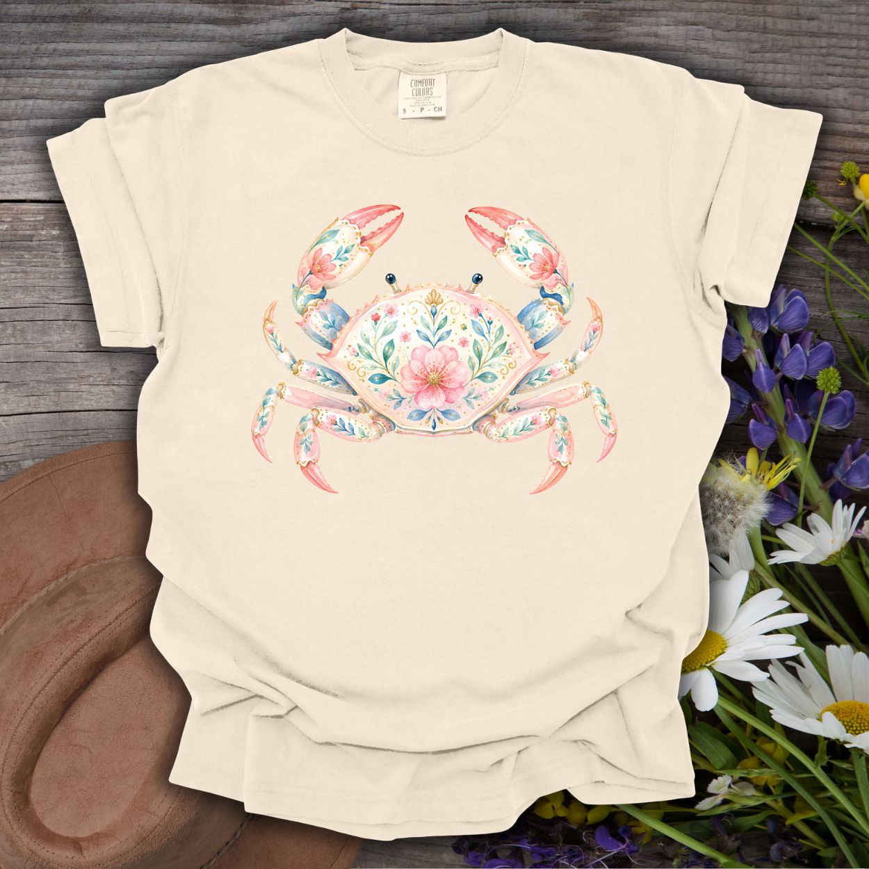 Ivory S t-shirt with a watercolor floral crab design, made from garment-dyed ring-spun cotton.