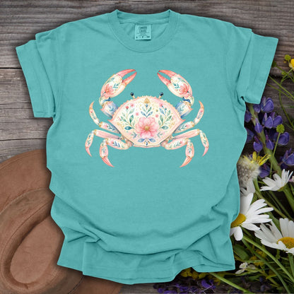 Seafoam green t-shirt with a watercolor floral crab design, made from garment-dyed ring-spun cotton.