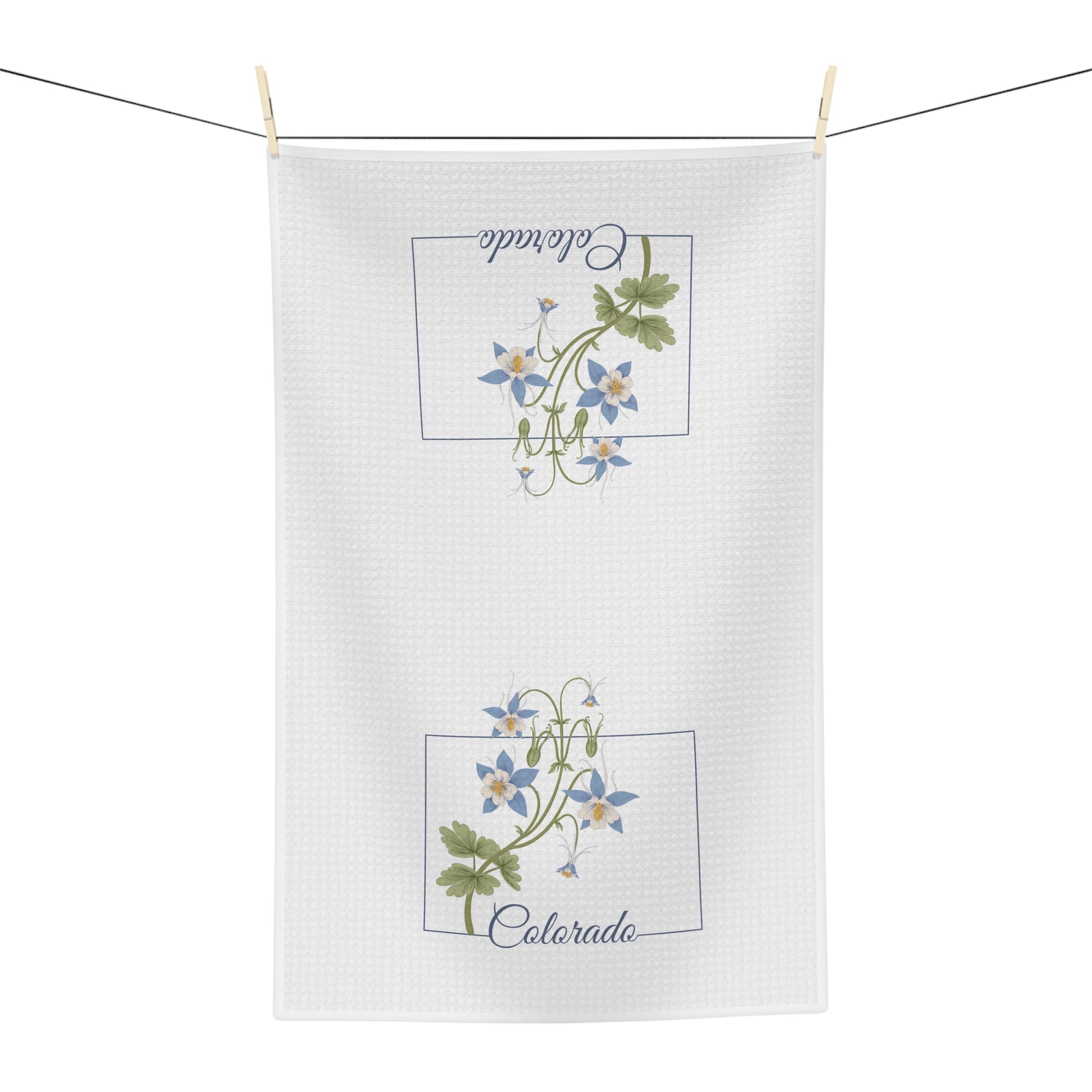 White microfiber tea towel with two framed blue columbine floral designs and "Colorado" text.