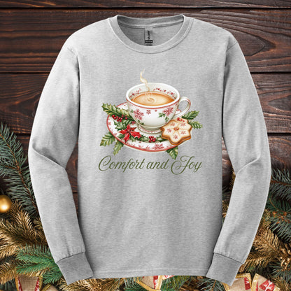 Ash gray long sleeve tee with a festive watercolor teacup, evergreens, gingerbread cookie, and "Comfort and Joy.