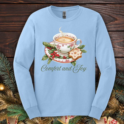 Light blue S long sleeve tee with watercolor teacup, evergreens, gingerbread, and "Comfort and Joy" text.