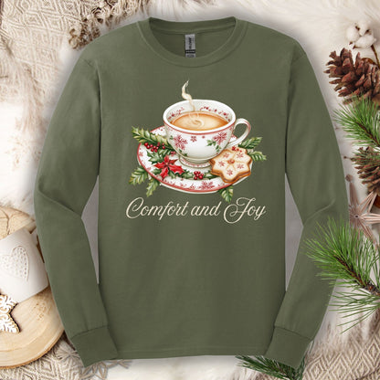 Military Green long sleeve tee with watercolor teacup, evergreens, gingerbread, and "Comfort and Joy" text.
