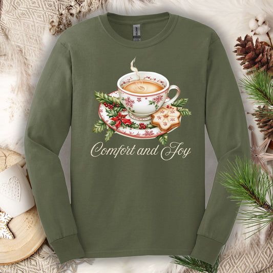 Military Green long sleeve tee with watercolor teacup, evergreens, gingerbread, and "Comfort and Joy" text.