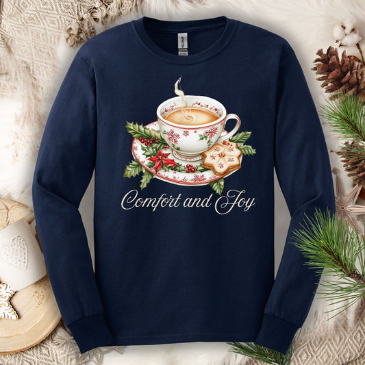 Navy long sleeve tee with watercolor teacup, evergreens, gingerbread cookie, and "Comfort and Joy" text.
