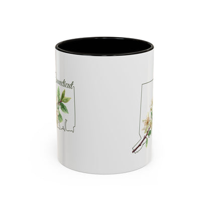 White ceramic mug with black interior and handle, featuring a watercolor Mountain Laurel bloom over a Connecticut outline.