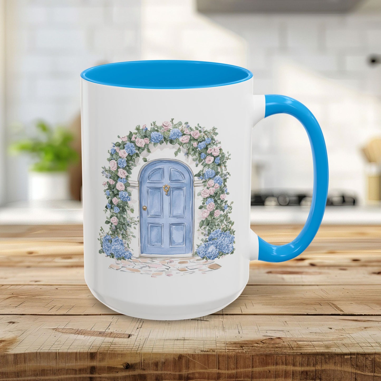 15oz ceramic mug with a light blue interior and handle, featuring a hand-painted blue door with climbing roses and hydrangeas.