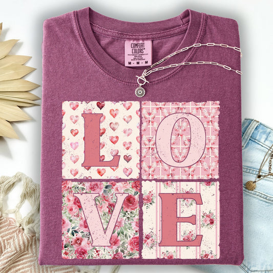 Berry cottagecore t-shirt with "LOVE" in patchwork floral and heart quilt letters.