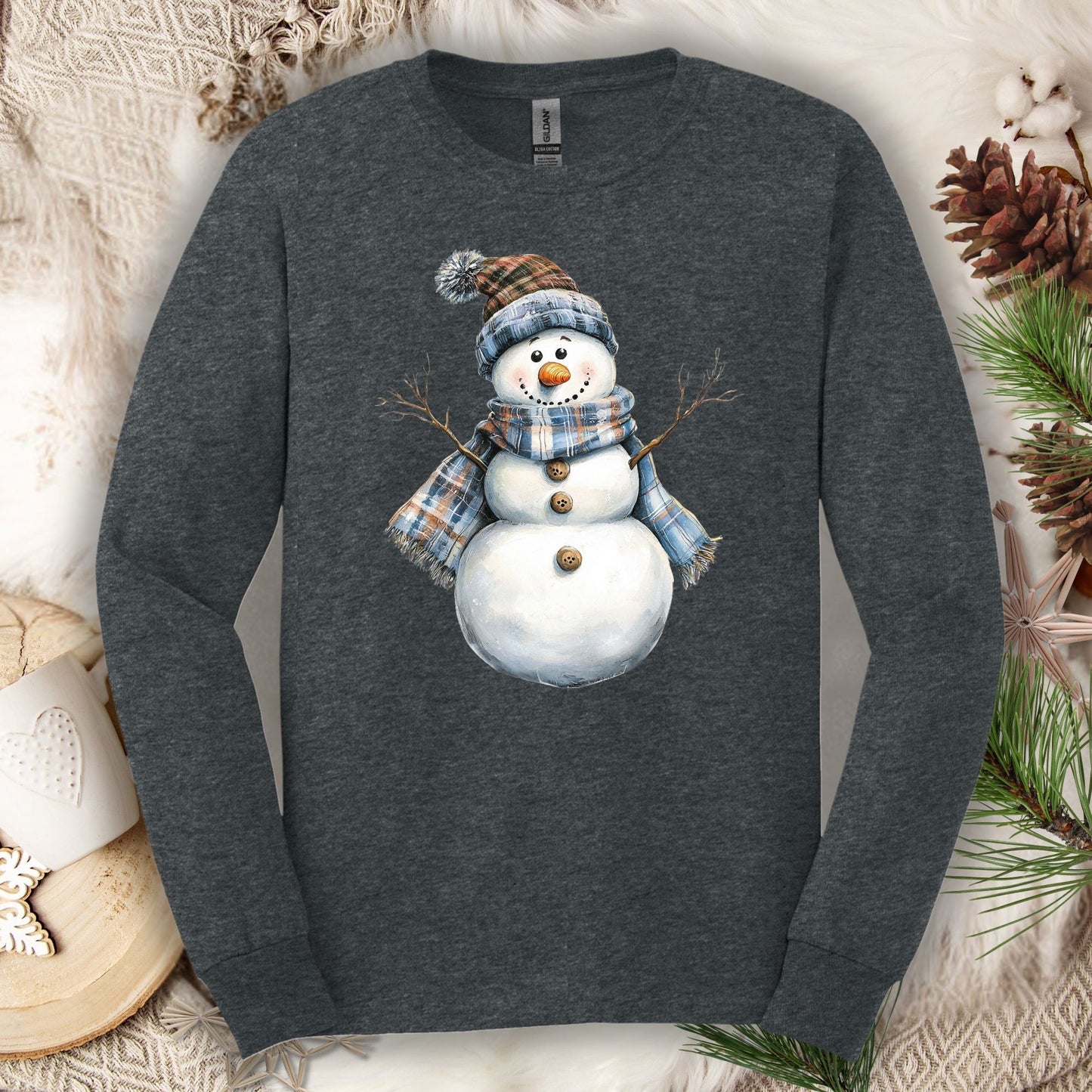 Dark Heather long sleeve tee with a country blue snowman wearing a plaid scarf and hat.