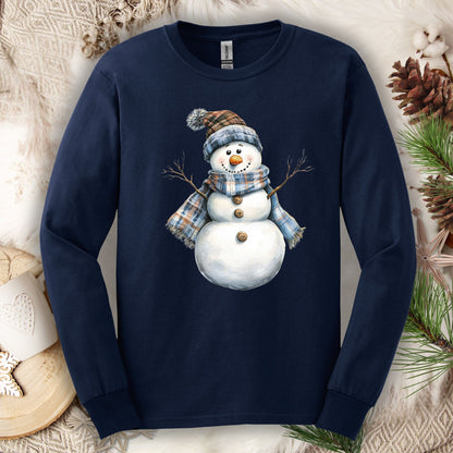 Navy long sleeve tee with a cute snowman wearing a blue and tan plaid scarf and hat.