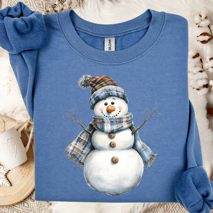 Indigo Blue S heavy blend sweatshirt with watercolor snowman in blue & tan plaid scarf and hat.