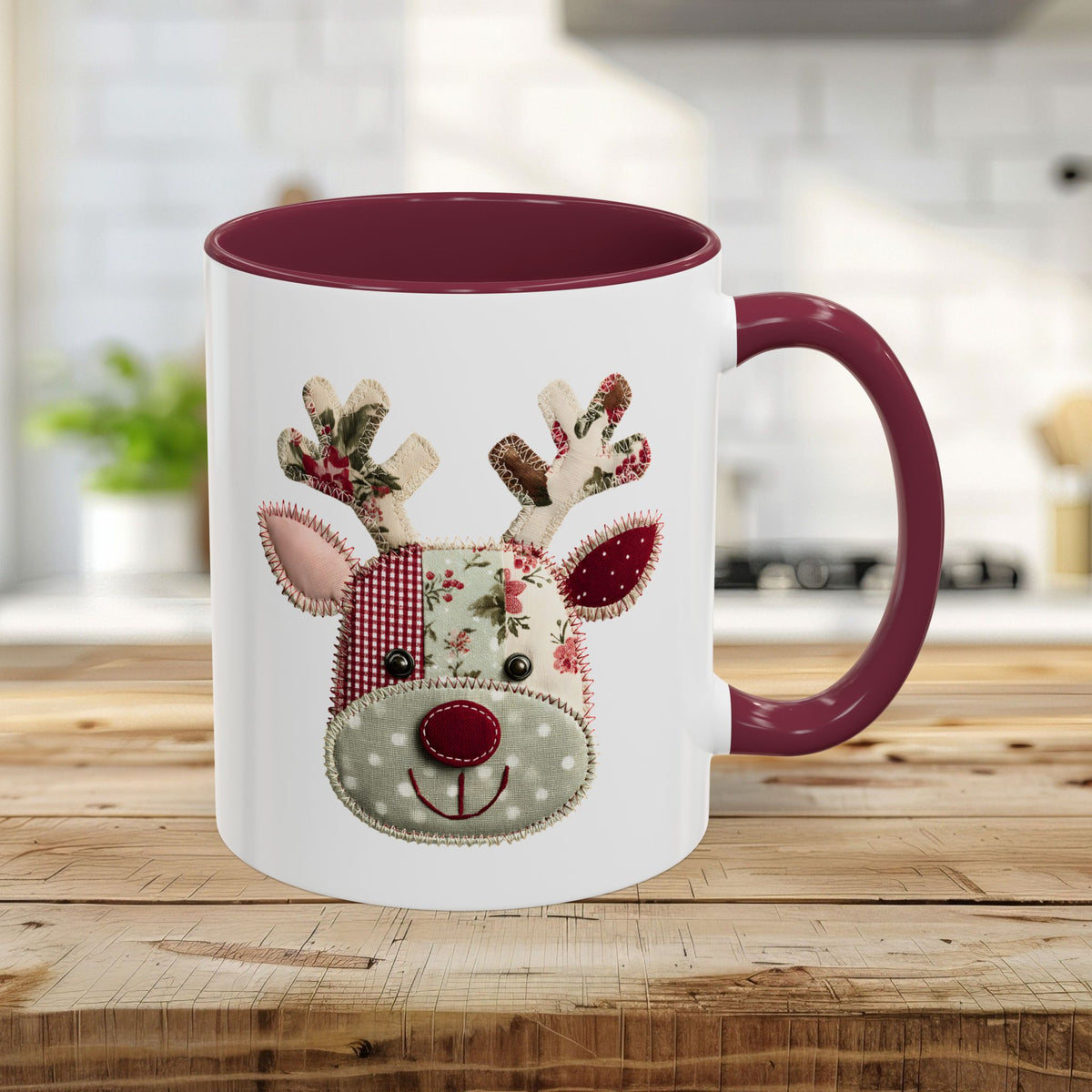 11oz ceramic mug with a maroon handle/interior and a patchwork Rudolph design.