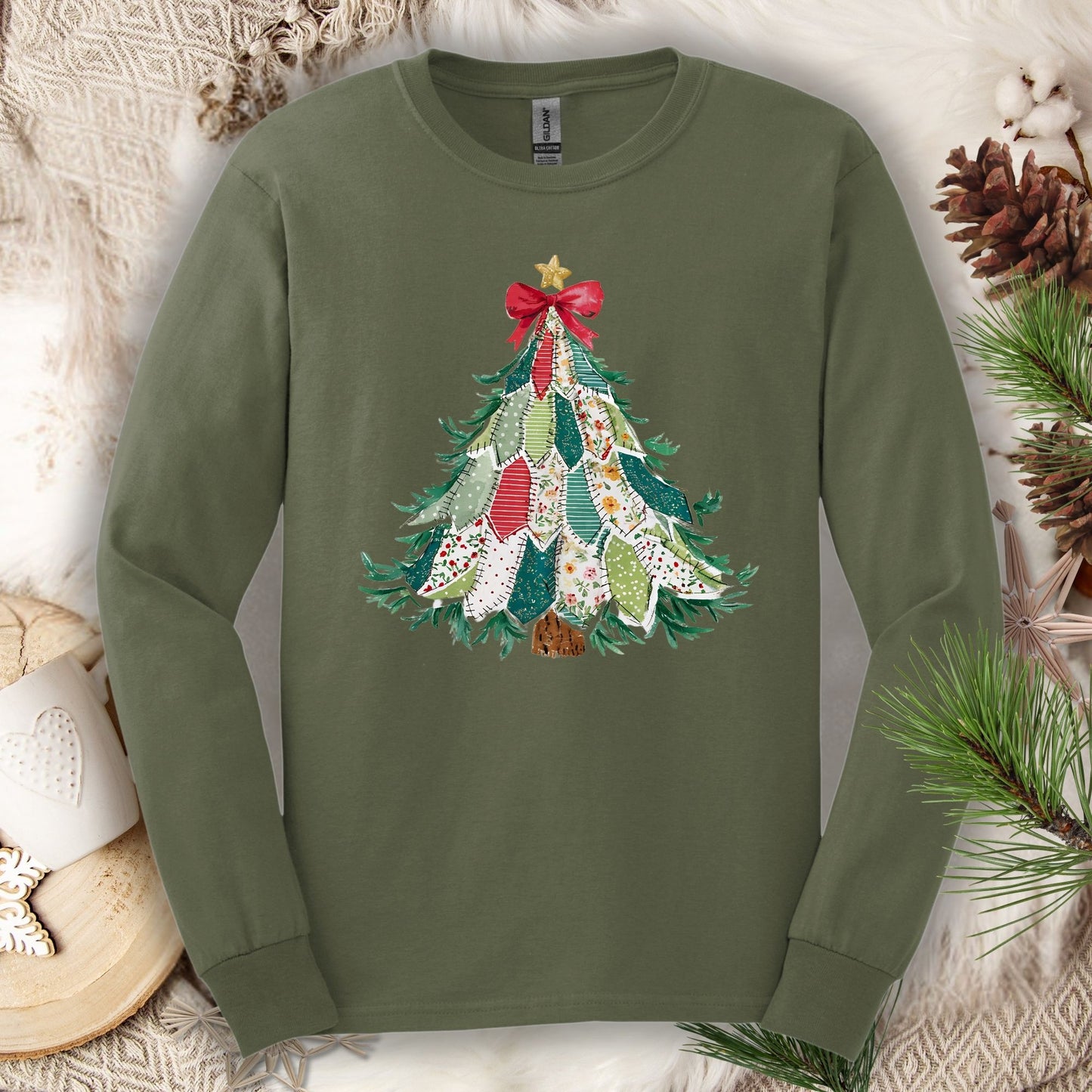 Military green long sleeve tee with a printed country-style quilted Christmas tree design.