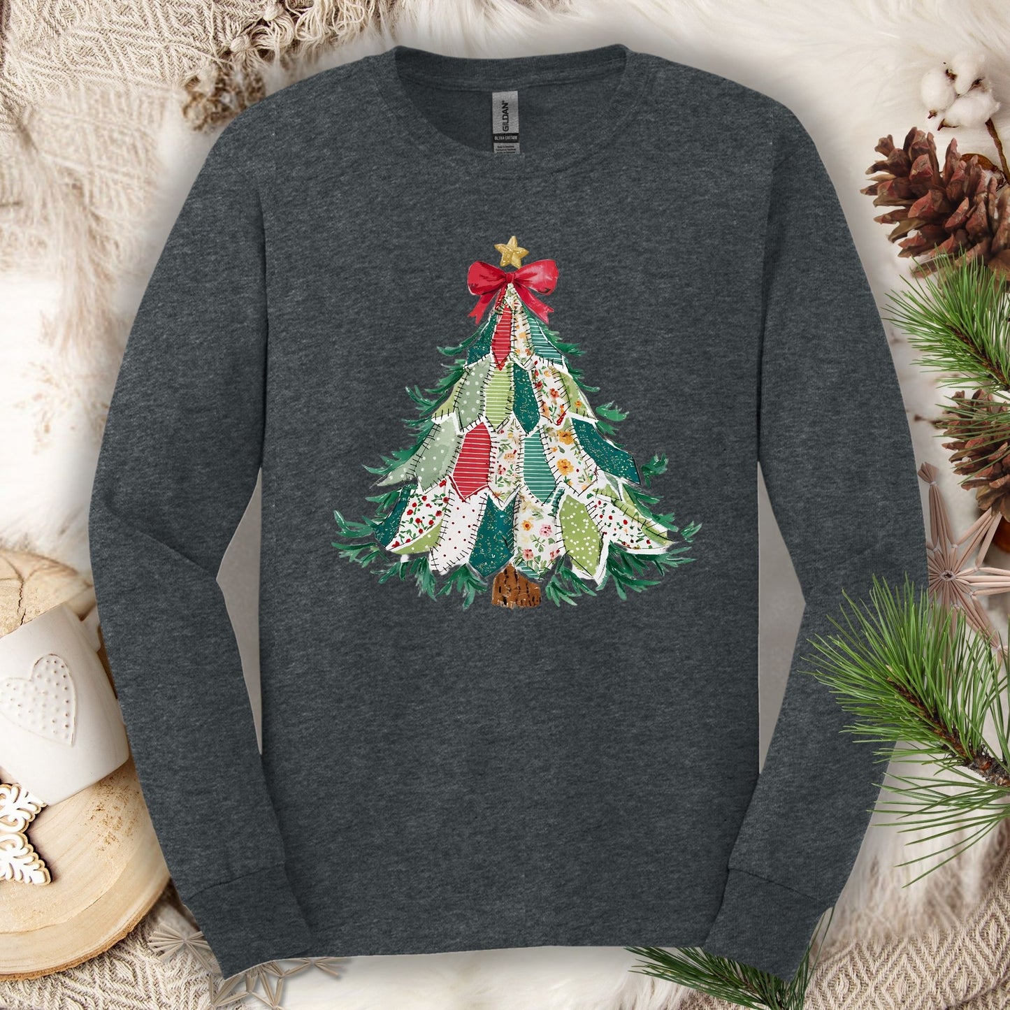 Dark Heather long sleeve tee with a printed country-style quilted Christmas tree design, featuring rustic patterns.