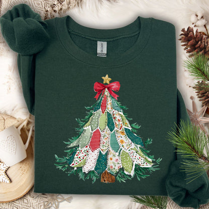 Forest Green Gildan sweatshirt with a printed country-style patchwork Christmas tree design, featuring rustic patterns and a red bow.