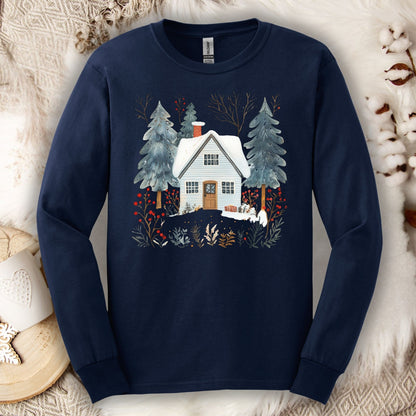 Navy long sleeve tee with a hand-drawn winter cabin and pine trees design, made from soft USA-grown cotton.