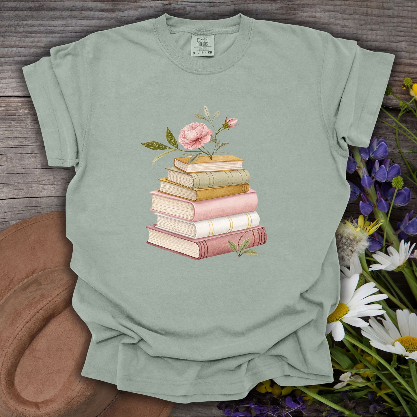 Bay S garment-dyed cotton t-shirt with a watercolor stack of books and pink floral design.