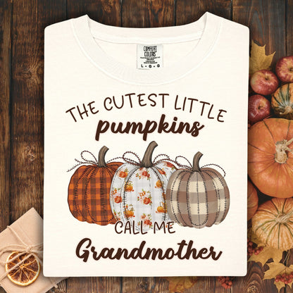 Ivory Comfort Colors® t-shirt with "The Cutest Little Pumpkins Call Me Grandmother" and three patterned pumpkins.
