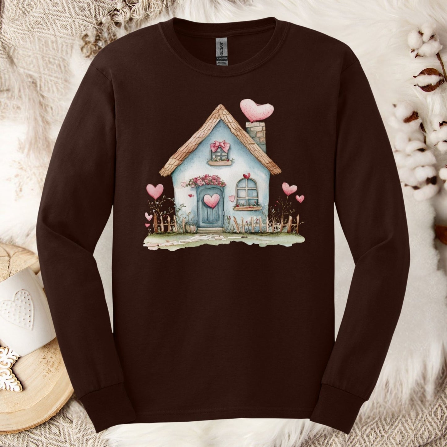 Dark Chocolate long sleeve tee with a watercolor blue cottage and pink hearts design.
