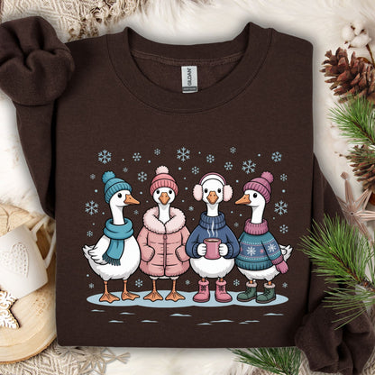 Dark Chocolate S sweatshirt with four geese in winter sweaters, hats, and mittens, drinking hot chocolate in snow.