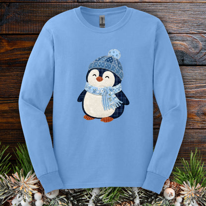 Carolina Blue long sleeve tee with a cute faux patchwork winter penguin in a blue hat and scarf.