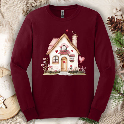 Maroon long sleeve tee with a watercolor beige cottage, pink hearts, and shutters design.