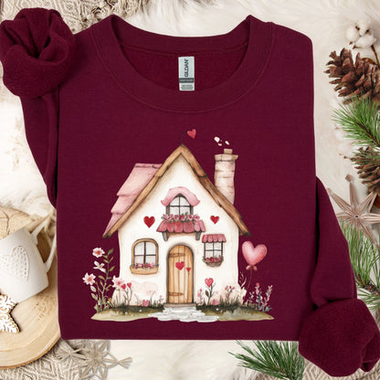 Maroon heavy blend sweatshirt with a watercolor pink Valentine's cottage design, hearts, and floral accents.