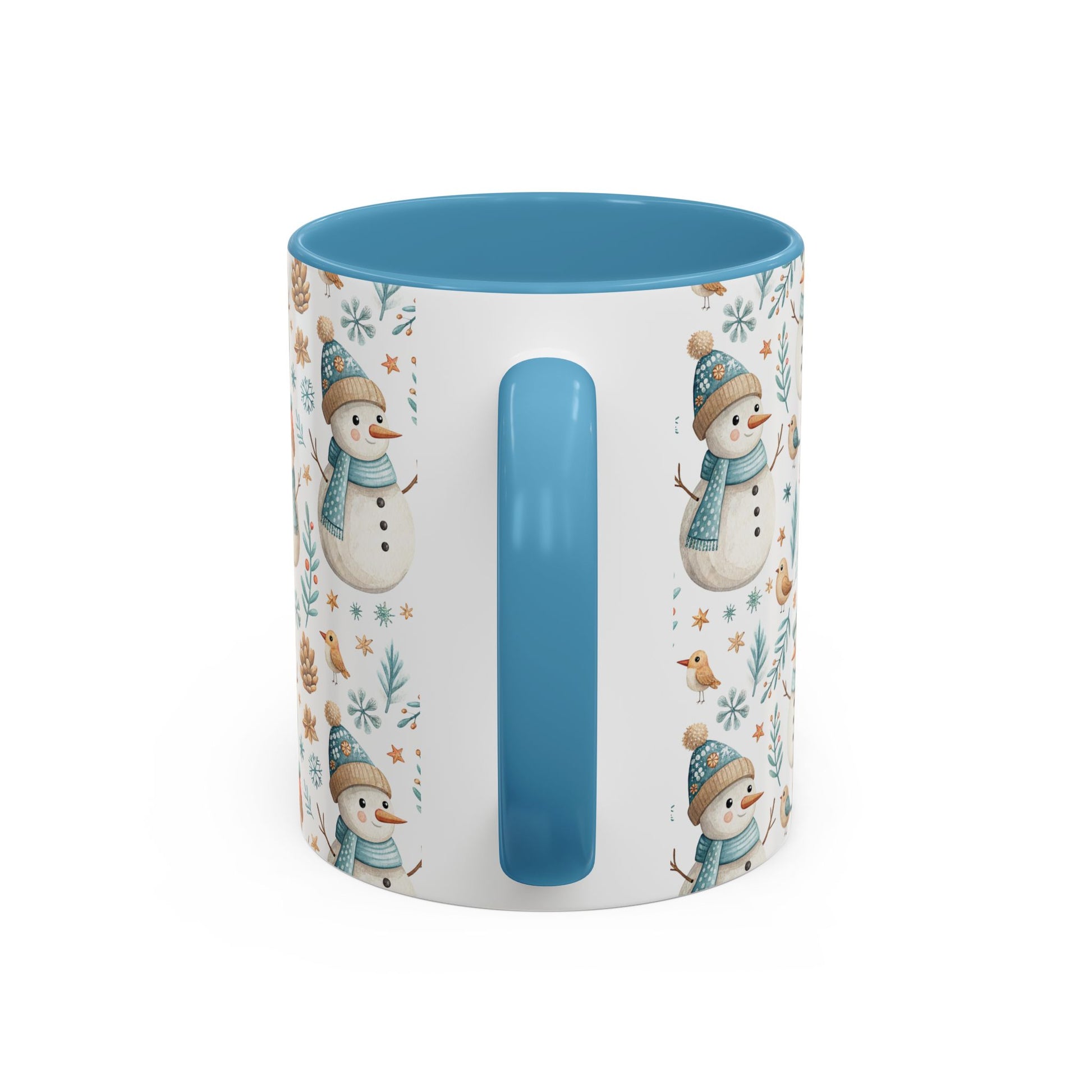 White ceramic mug with blue interior and handle, featuring watercolor snowmen, birds, and pinecones.