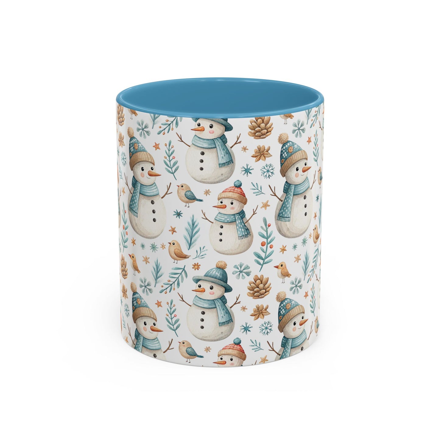 White ceramic mug with watercolor snowmen, birds, pinecones, and snowflakes, featuring a blue interior.