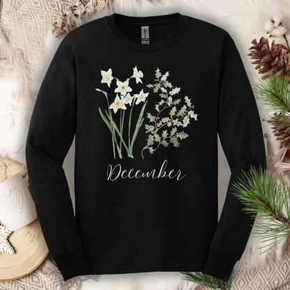 Black long-sleeve tee with watercolor narcissus, holly, and "December" script.