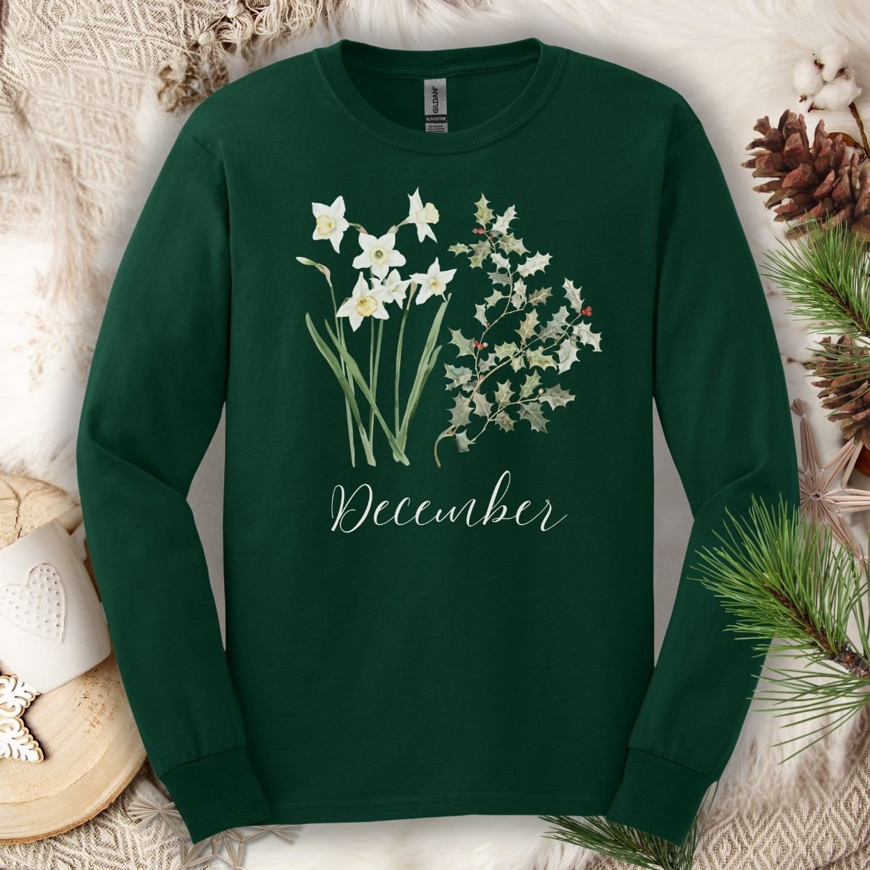 Forest Green long sleeve tee with watercolor narcissus, holly, and "December" script.