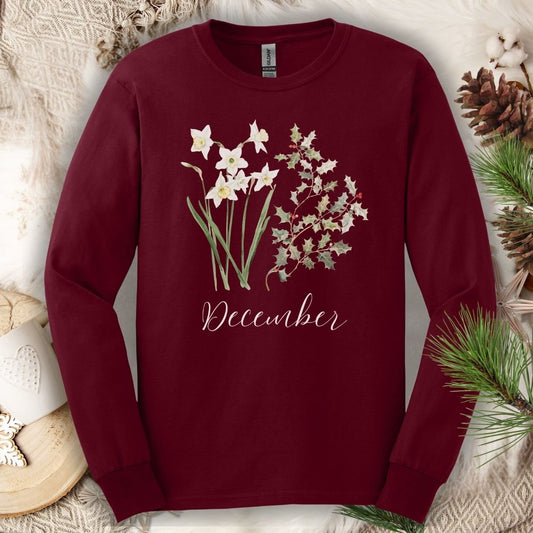 Maroon long sleeve tee with watercolor narcissus, holly berries, and "December" script.