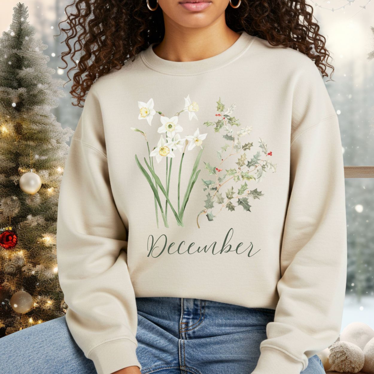 Unisex beige crewneck sweatshirt with watercolor narcissus, holly, and "December" text.