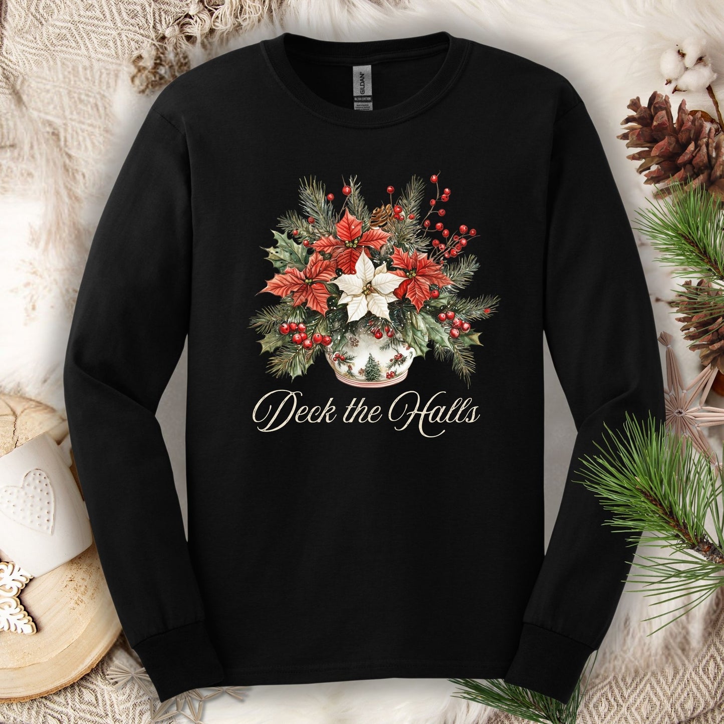 Black Gildan long sleeve tee with watercolor poinsettia arrangement and "Deck the Halls" script.