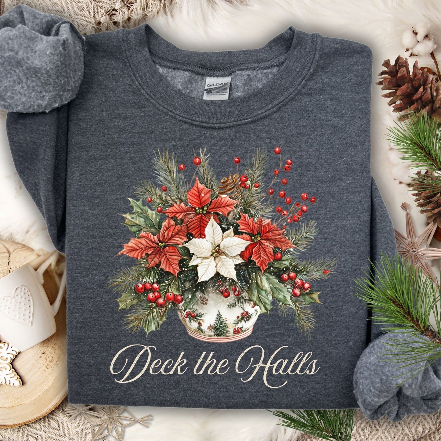 Dark Heather Gildan sweatshirt with watercolor poinsettia bouquet in a vase and "Deck the Halls" text.