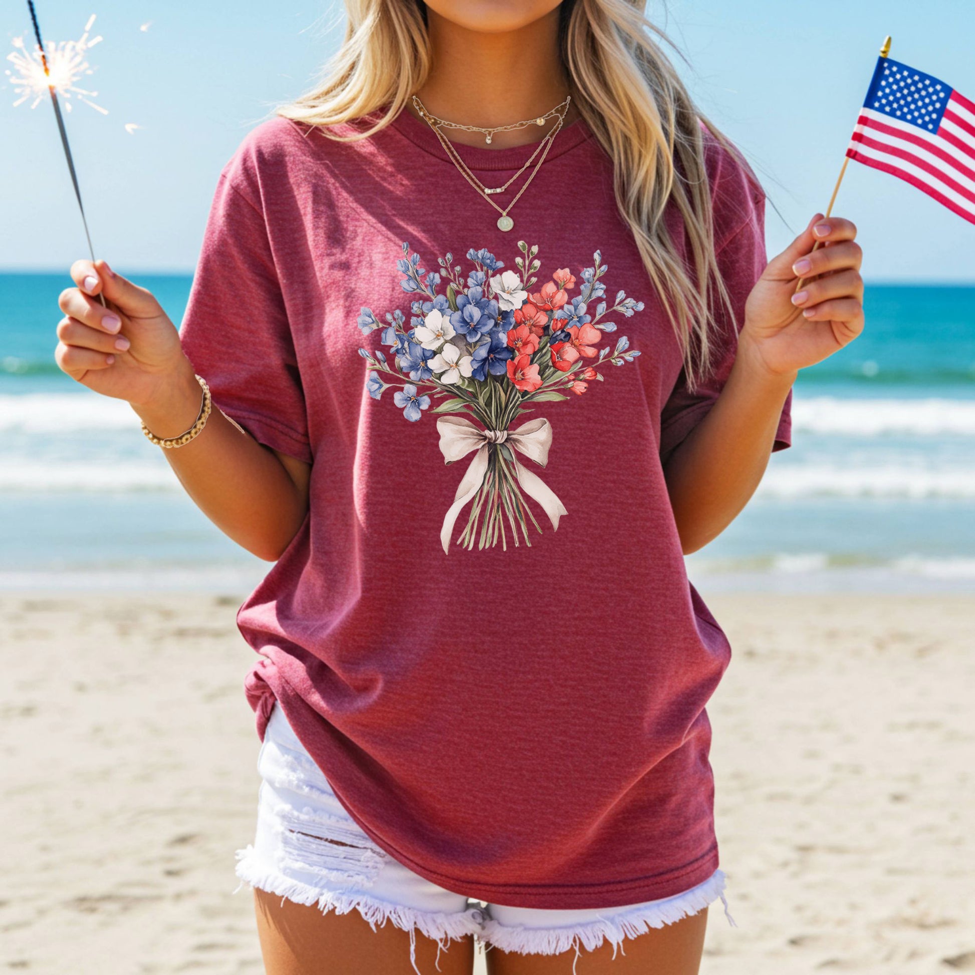 Relaxed-fit, garment-dyed t-shirt with a patriotic red, white, and blue floral bouquet design.