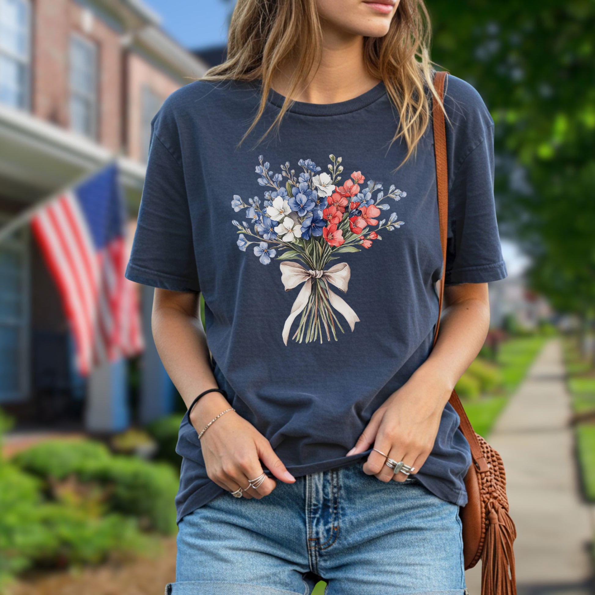 Relaxed-fit, garment-dyed navy t-shirt with a patriotic red, white, and blue floral bouquet design.