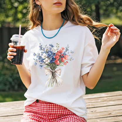 White relaxed-fit t-shirt with a vintage patriotic red, white, and blue floral bouquet graphic.