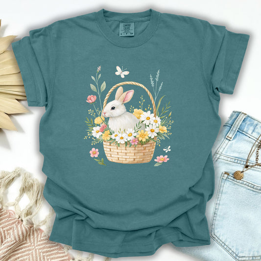 Blue Spruce garment-dyed cotton t-shirt with a watercolor bunny in a floral basket design.