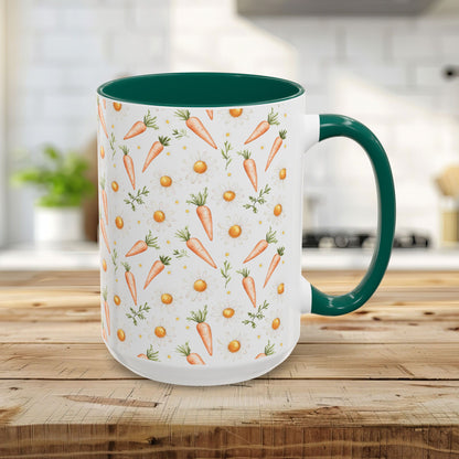 15oz ceramic mug with a green interior/handle and a white exterior featuring a watercolor carrot and daisy pattern.